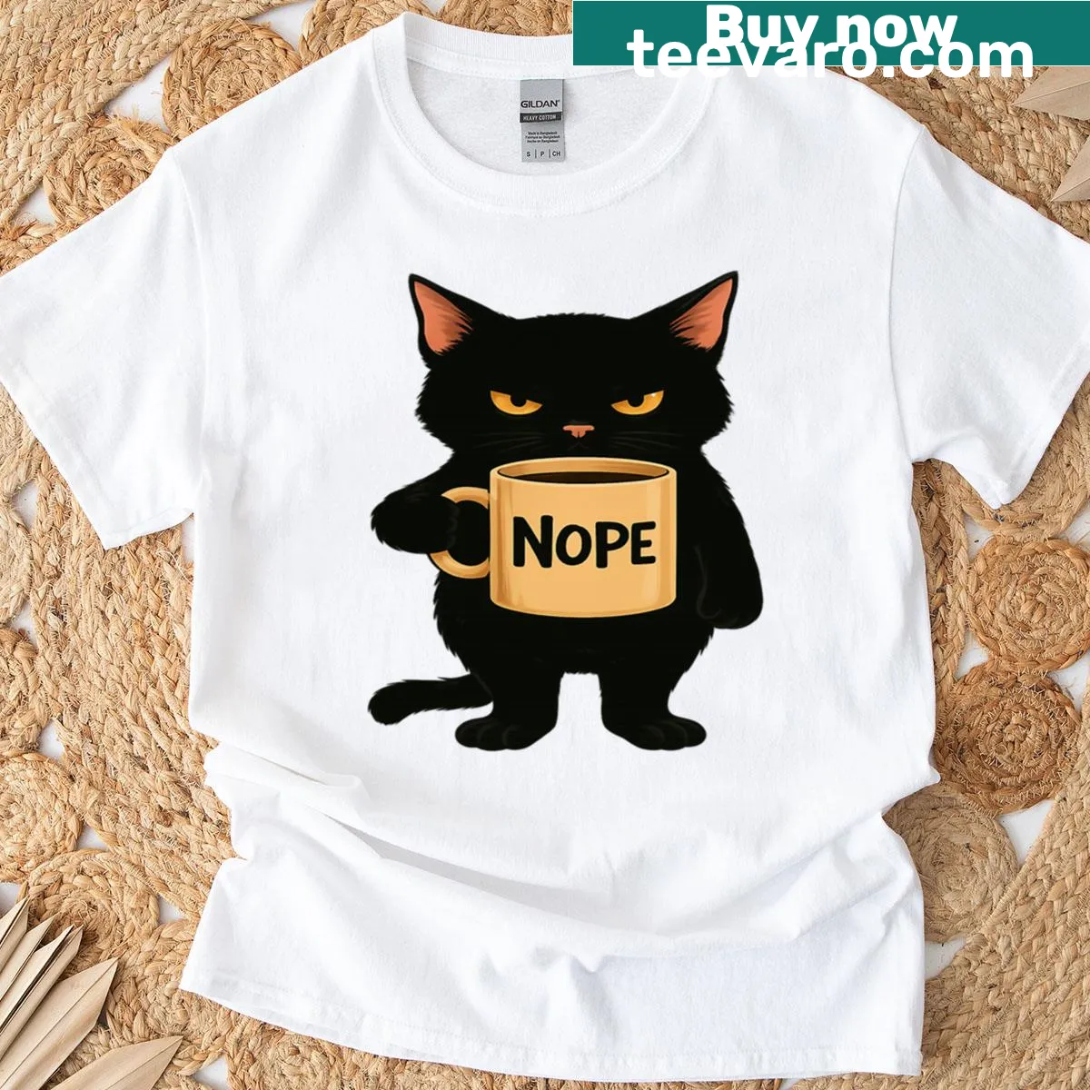 Cartoon grumpy black cat t-shirt featuring a coffee mug design — on a men's t-shirt