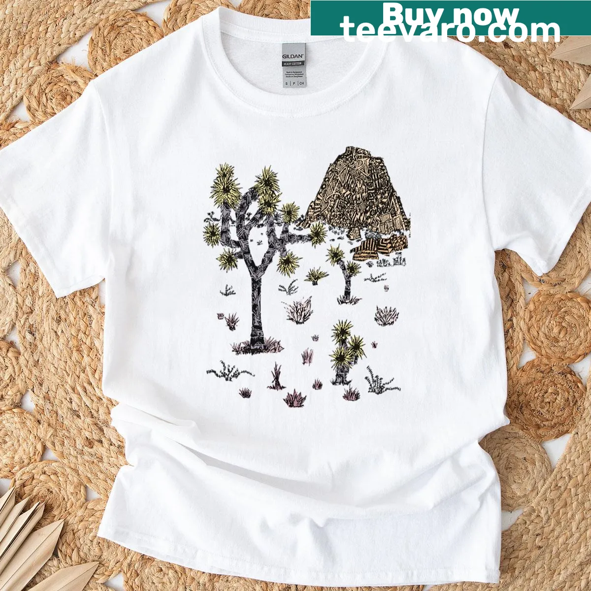 Illustrated T-shirt featuring Joshua trees and rocks, perfect for nature lovers. — on a men's t-shirt