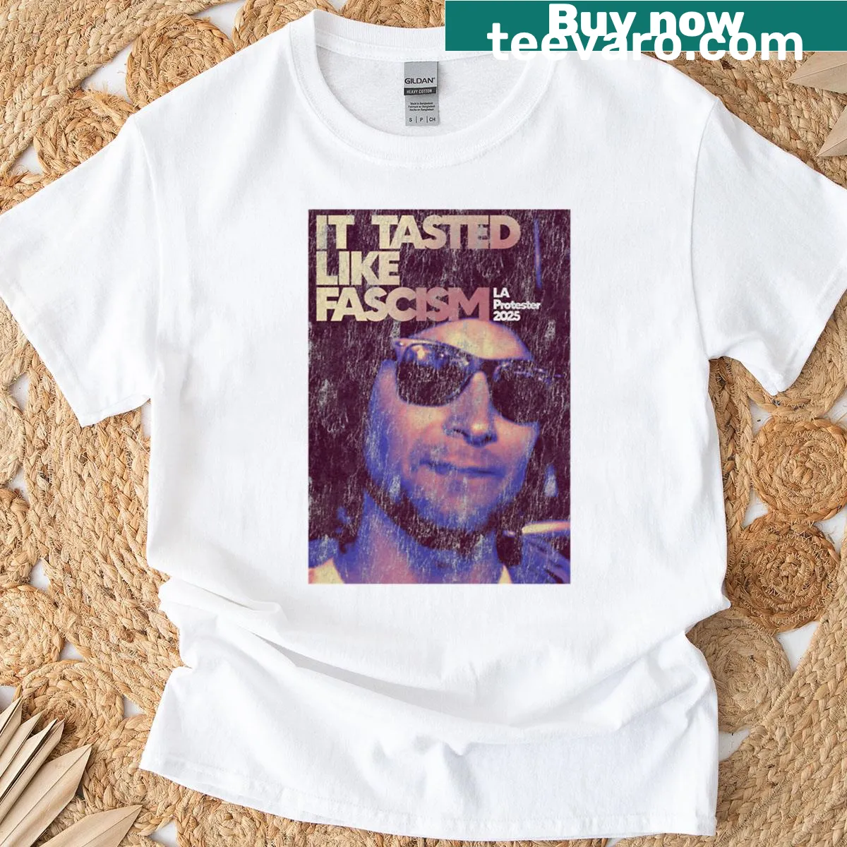 Provocative tee with the phrase 'It Tasted Like Fascism' and bold graphics. — on a men's t-shirt