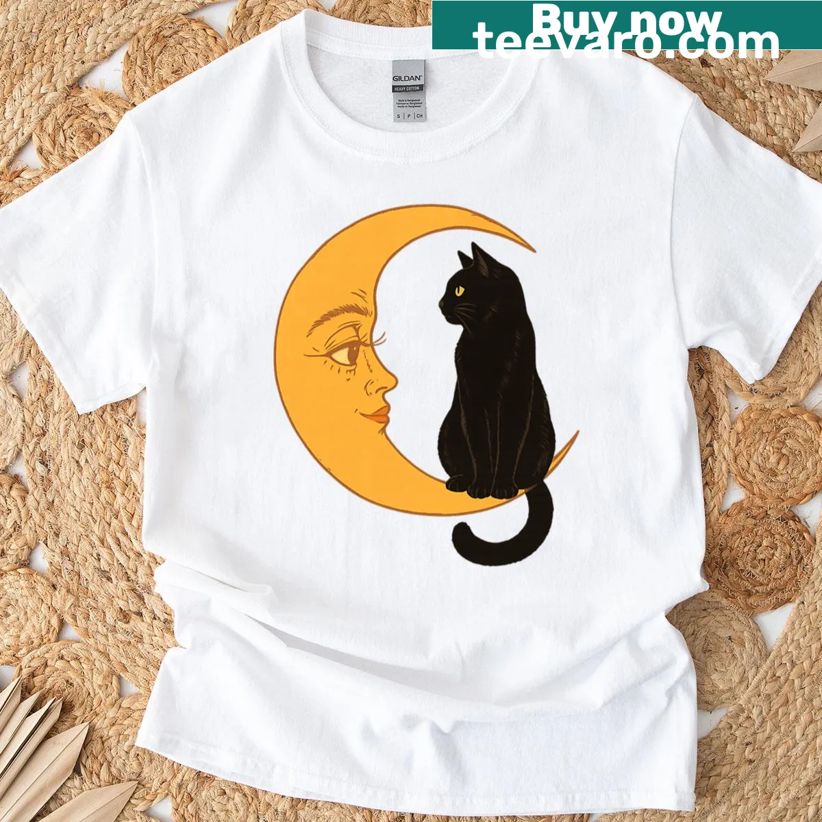 T-shirt featuring a black cat and crescent moon design in a celestial theme. — on a men's t-shirt