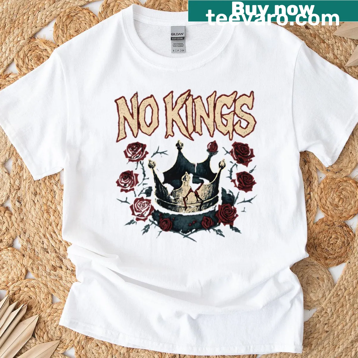 T-shirt with a broken crown graphic symbolizing anti-monarchy — on a men's t-shirt