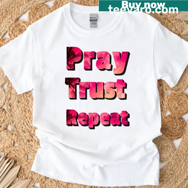 Typography t-shirt with the phrase 'Pray Trust Repeat'