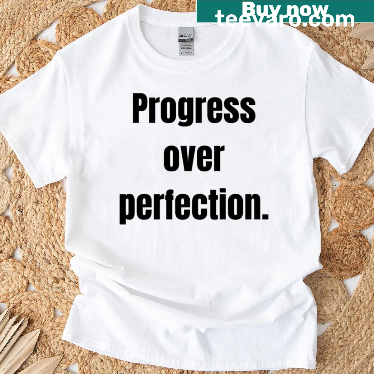 T-shirt with the phrase 'Progress Over Perfection' in bold typography — on a men's t-shirt