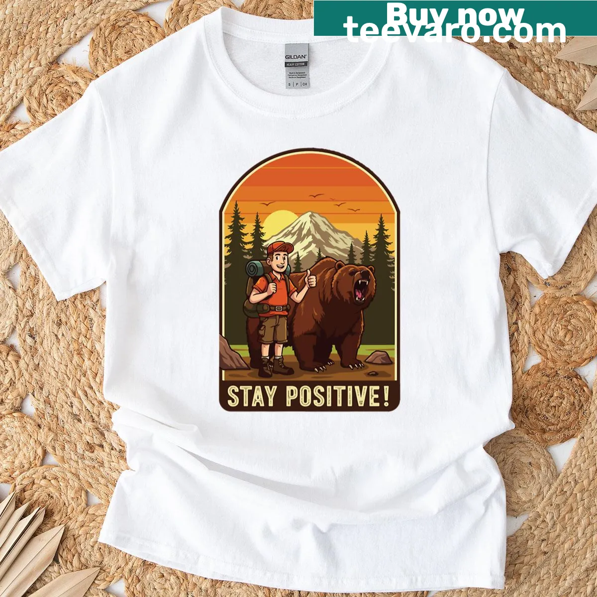 Motivational bear design T-shirt with 'Stay Positive' text — on a men's t-shirt