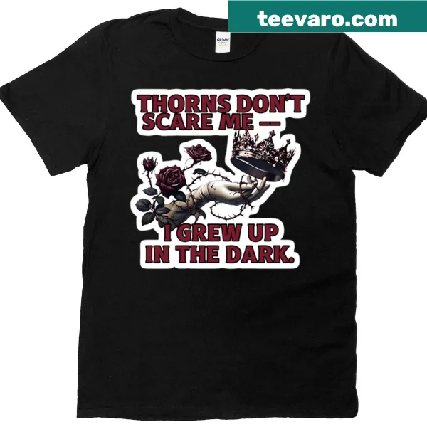 T-shirt with the phrase 'Thorns Don't Scare Me' in bold typography.