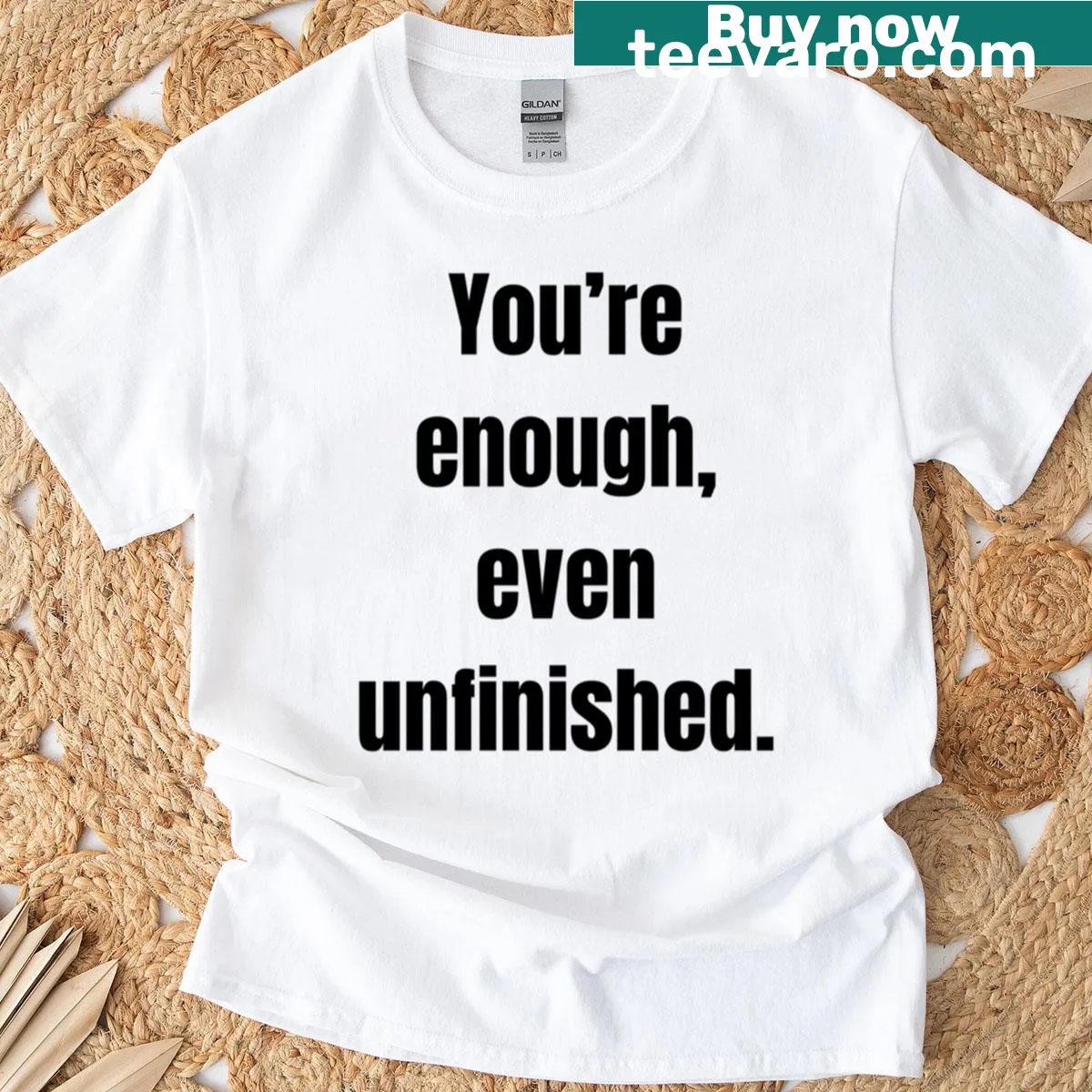 Inspirational t-shirt with minimalist design stating 'You’re Enough Even Unfinished' — on a men's t-shirt