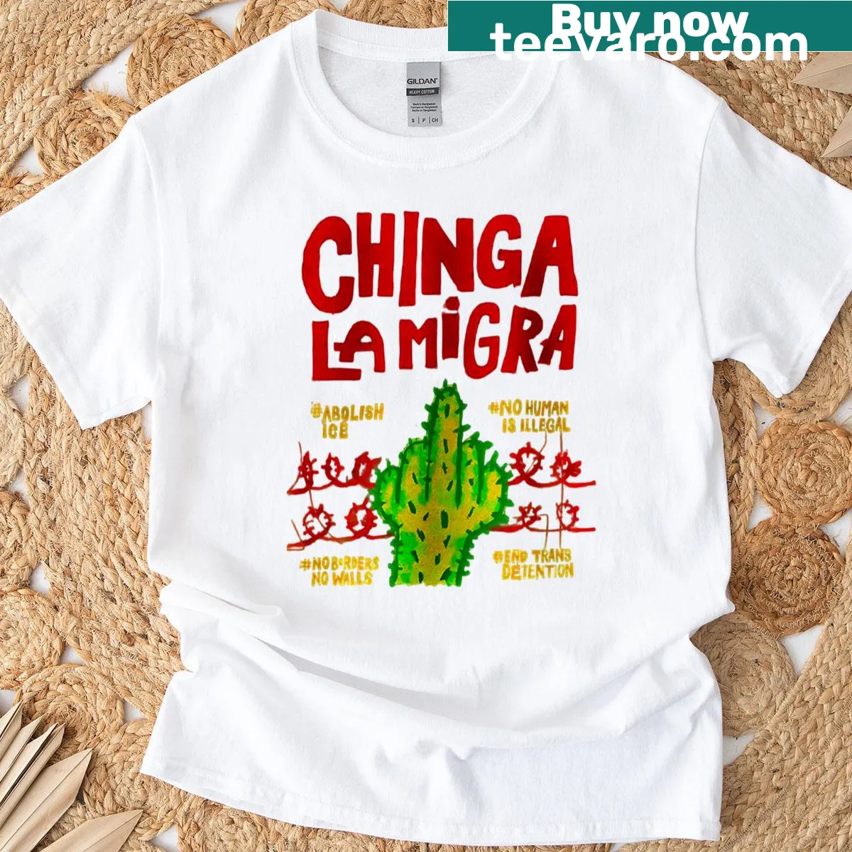 Activist T-shirt with the phrase 'Abolish ICE No Human Is Illegal'. — on a men's t-shirt