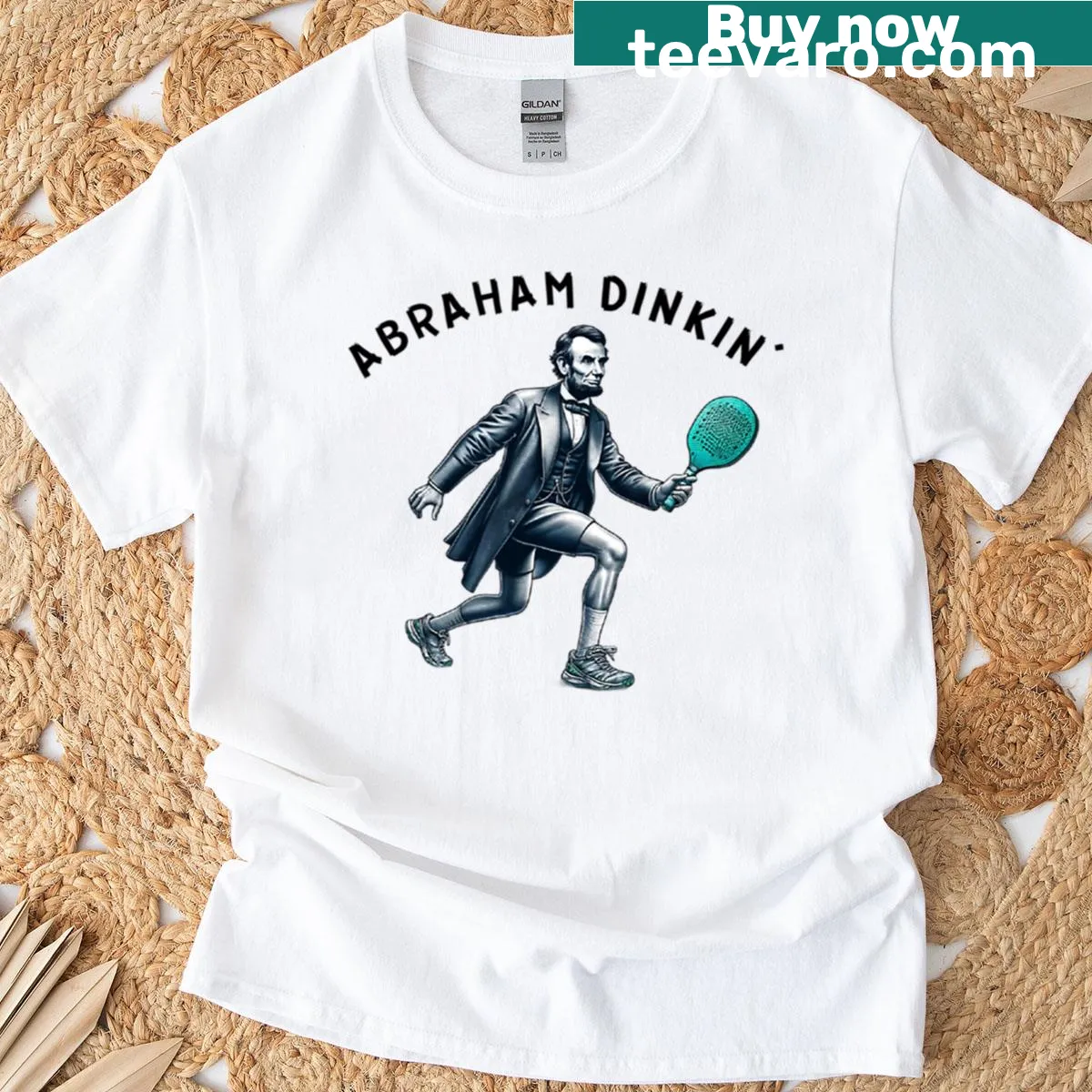 Illustration of Abraham Lincoln with a pickleball paddle on a t-shirt. — on a men's t-shirt