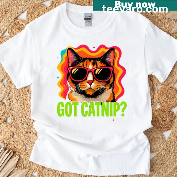 Whimsical T-shirt featuring a calico cat with sunglasses and groovy design.