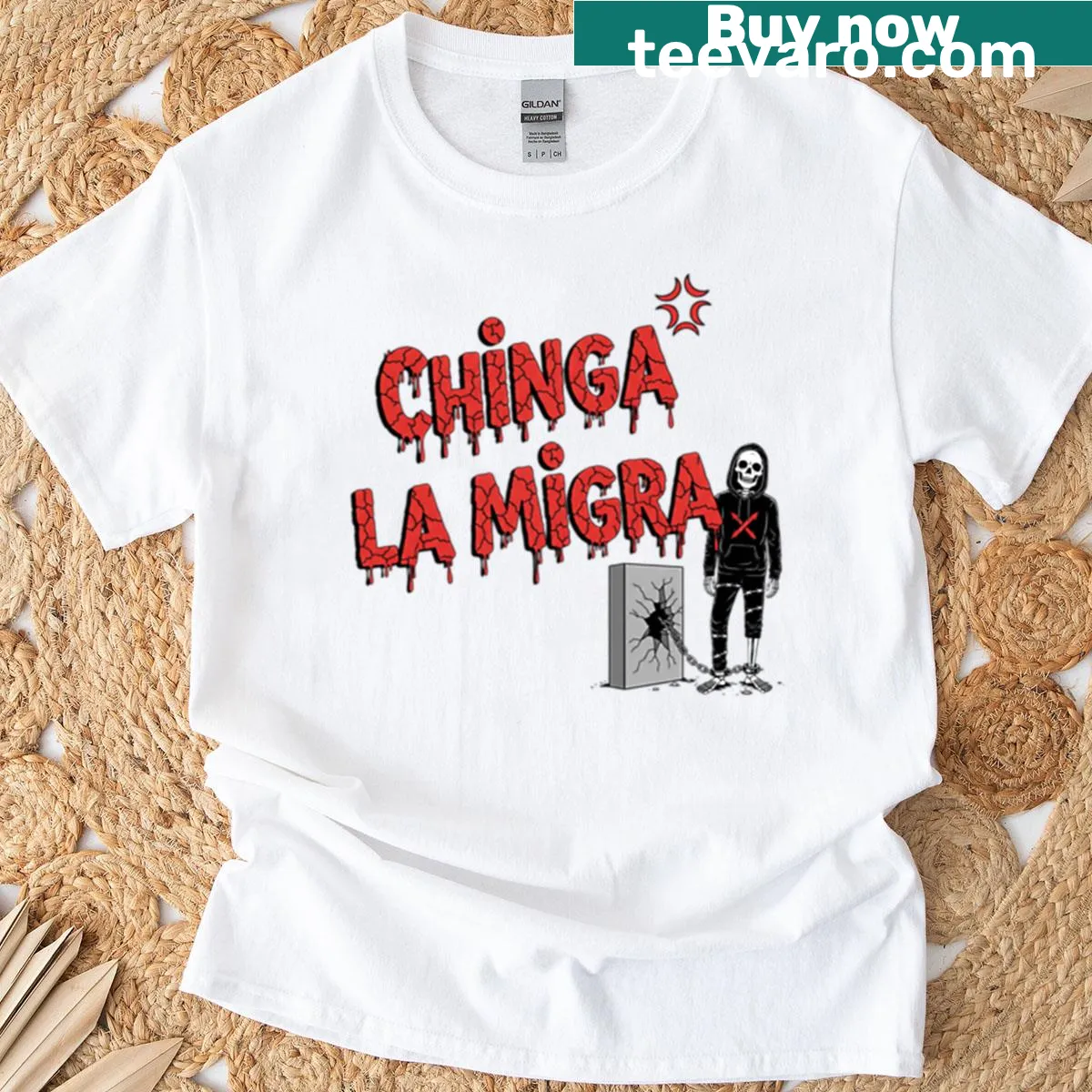Fitted T-shirt with the phrase 'Chinga La Migra' in bold typography. — on a men's t-shirt