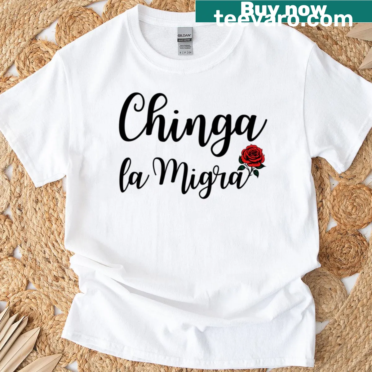 Text 'Chinga La Migra Latina Strong' with artistic embellishments. — on a men's t-shirt