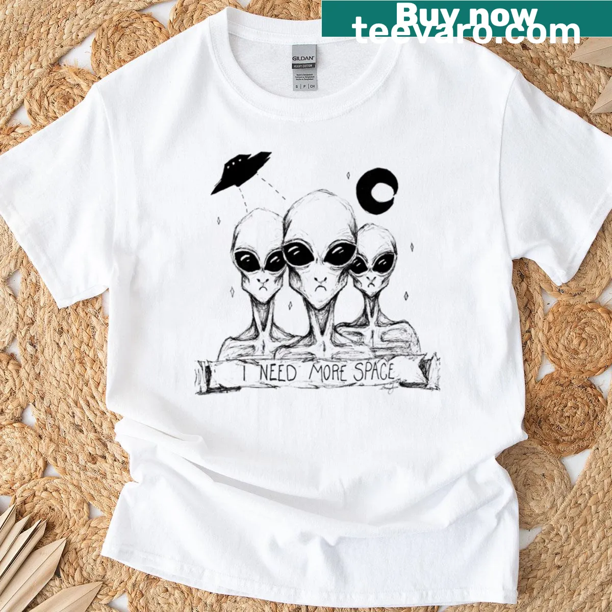 T-shirt with an illustration of an alien and the phrase 'I Need More Space' — on a men's t-shirt