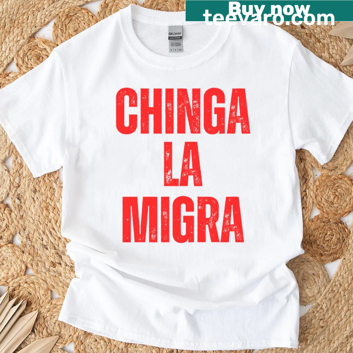 T-shirt with the phrase 'Chinga La Migra' for immigration rights — on a men's t-shirt