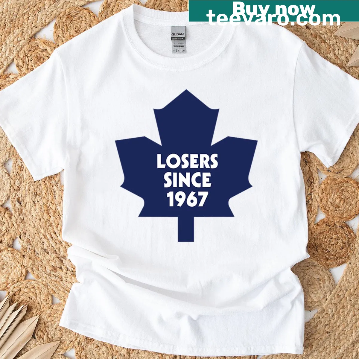 Humorous T-shirt stating 'Losers Since 1967' in bold typography. — on a men's t-shirt