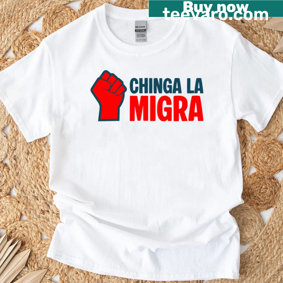 Typography tee with the phrase Chinga La Migra in bold letters — on a men's t-shirt