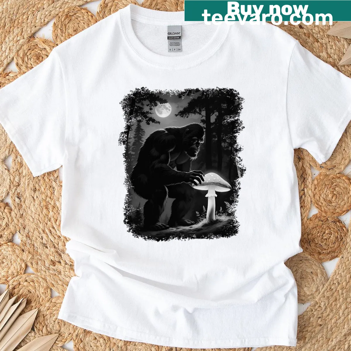 Illustrated T-shirt featuring Bigfoot and morel mushrooms — on a men's t-shirt