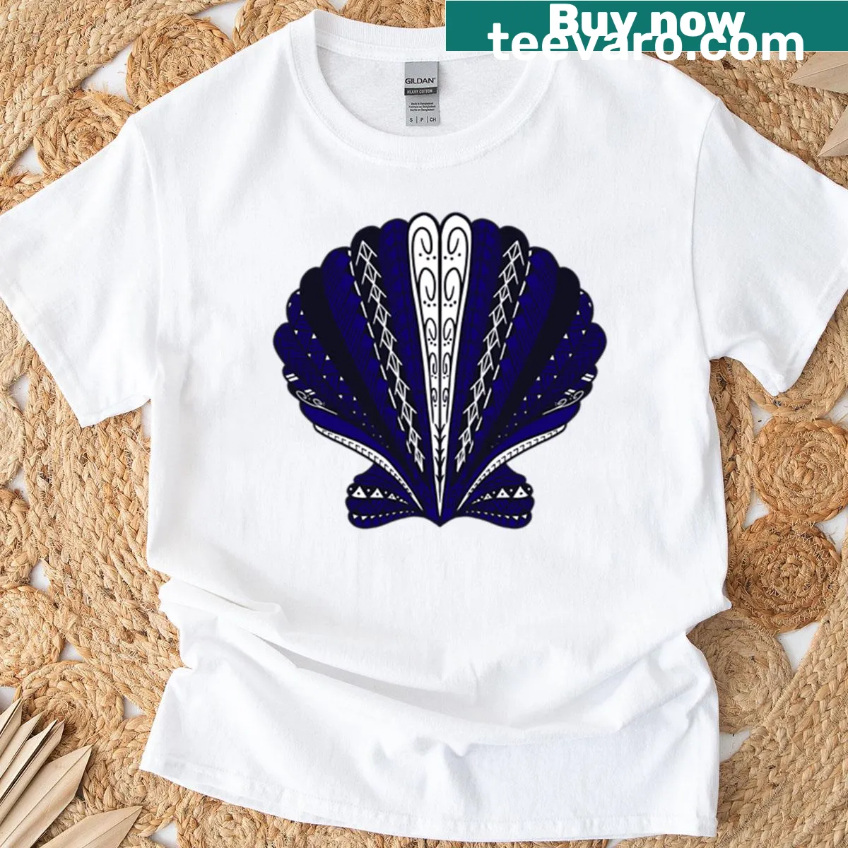 Minimalist silhouette T-shirt featuring a blue tribal clam shell design — on a men's t-shirt