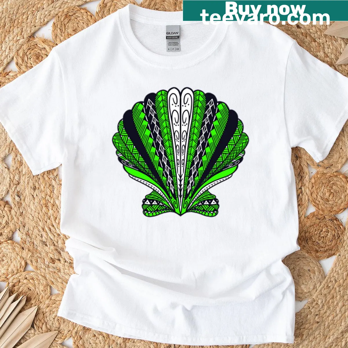 Bright green T-shirt featuring a tribal clam sea shell graphic. — on a men's t-shirt
