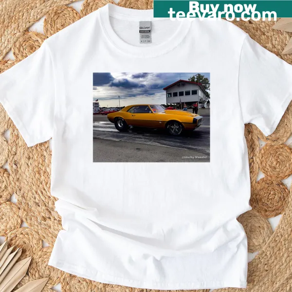 Gold oversized t-shirt with desert landscape illustration