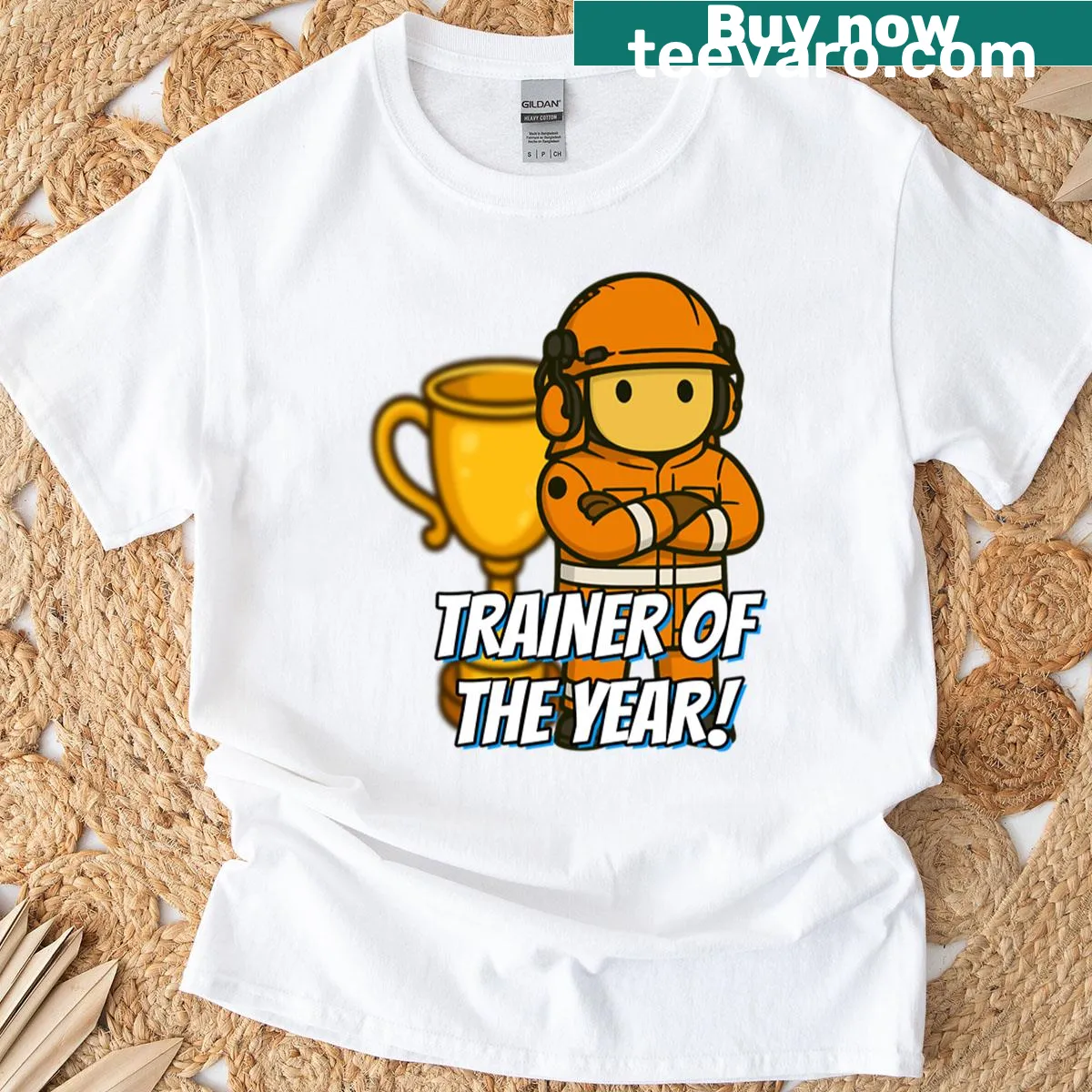 T-shirt featuring bold text 'Trainer Of The Year' for fitness enthusiasts. — on a men's t-shirt