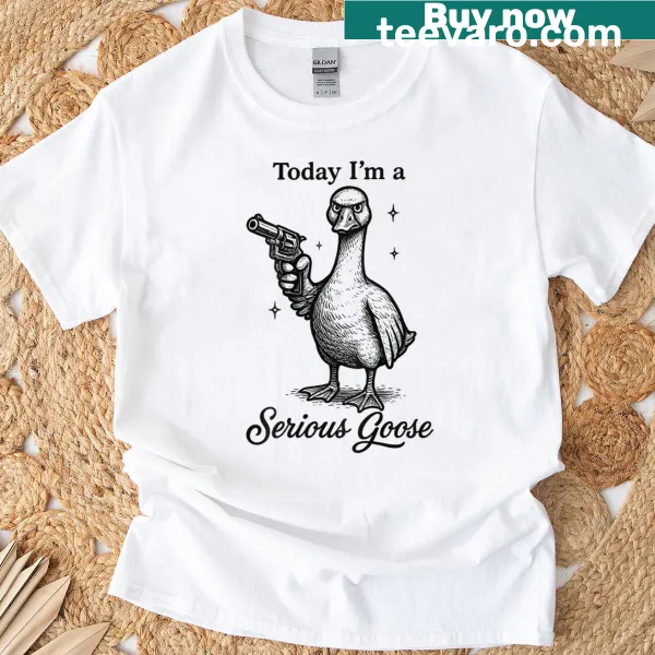 Funny T-shirt featuring a serious goose illustration with a gun
