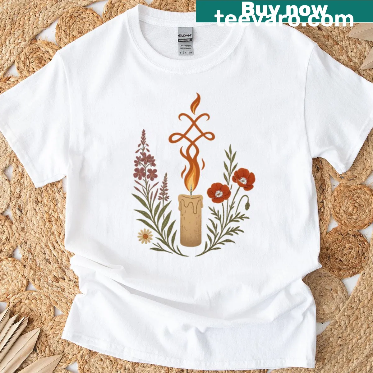 Oversized T-shirt with witch flame candle and poppies design — on a men's t-shirt