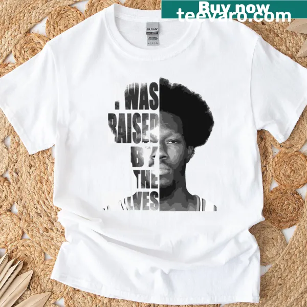 Bold typography t-shirt featuring 'Raised By The Wolves'