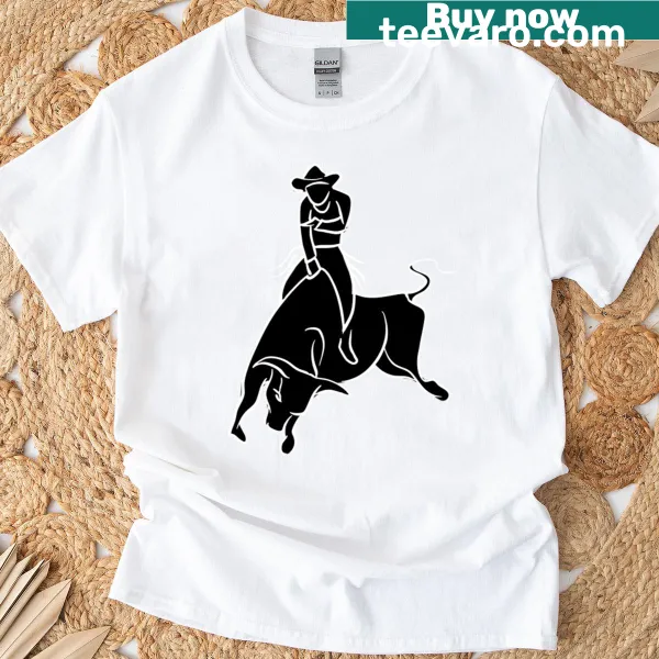 T-shirt depicting a bull rider in action with a twisting design
