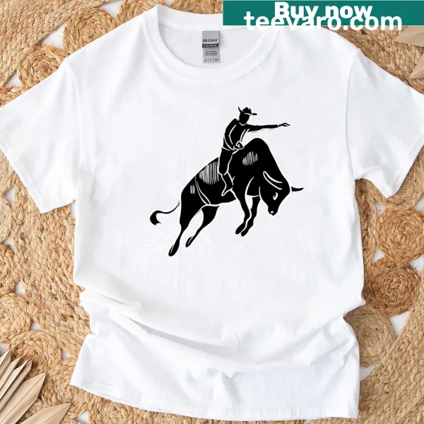Bull rider graphic shirt featuring a cowboy leaping from a bull