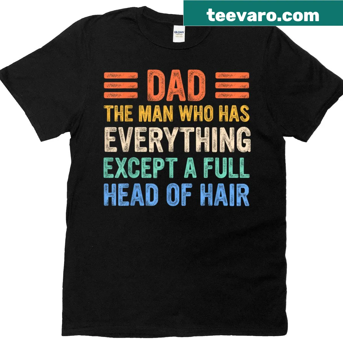 Funny T-shirt for bald dads stating 'The Man Who Has Everything Except Hair'. — on a men's t-shirt