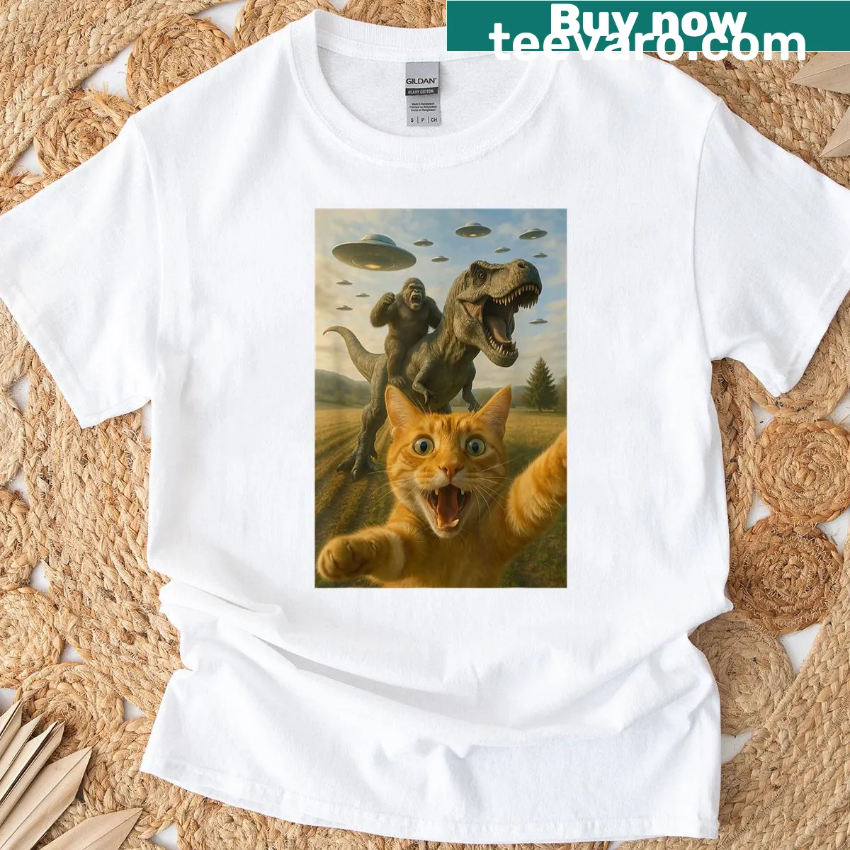 Humorous T-shirt featuring a scared cat with T-rex and UFO imagery — on a men's t-shirt