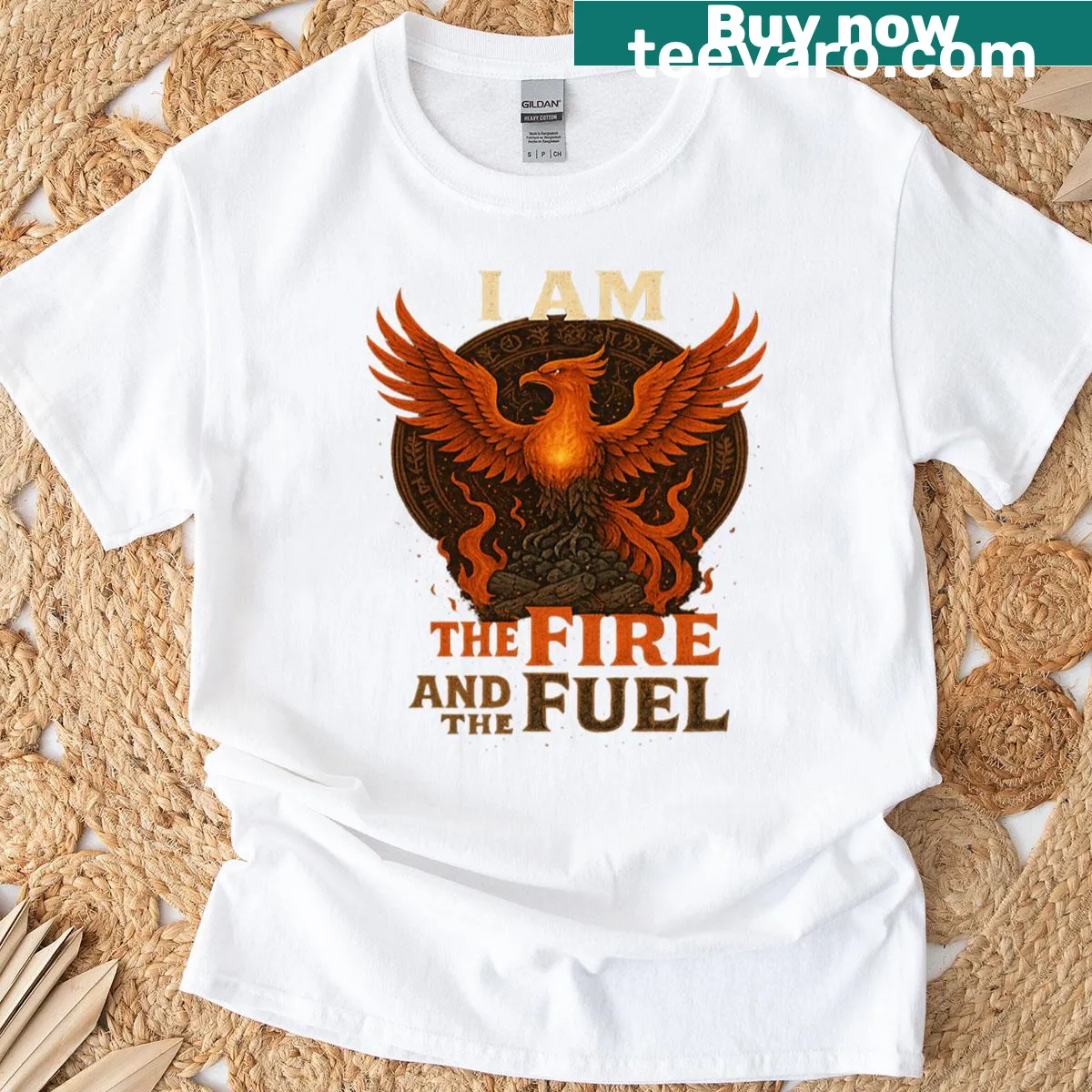 Illustrative T-shirt featuring a phoenix and motivational text — on a men's t-shirt
