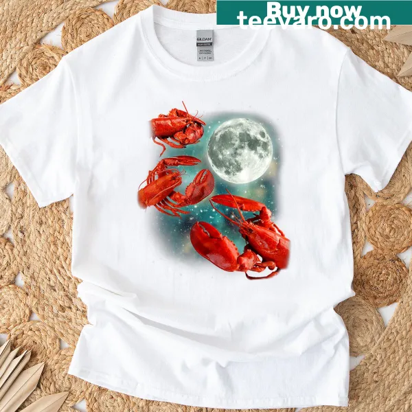 Cartoon lobsters under a moon graphic on a T-shirt