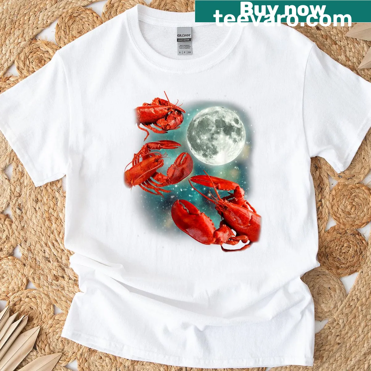 Cartoon lobsters under a moon graphic on a T-shirt — on a men's t-shirt