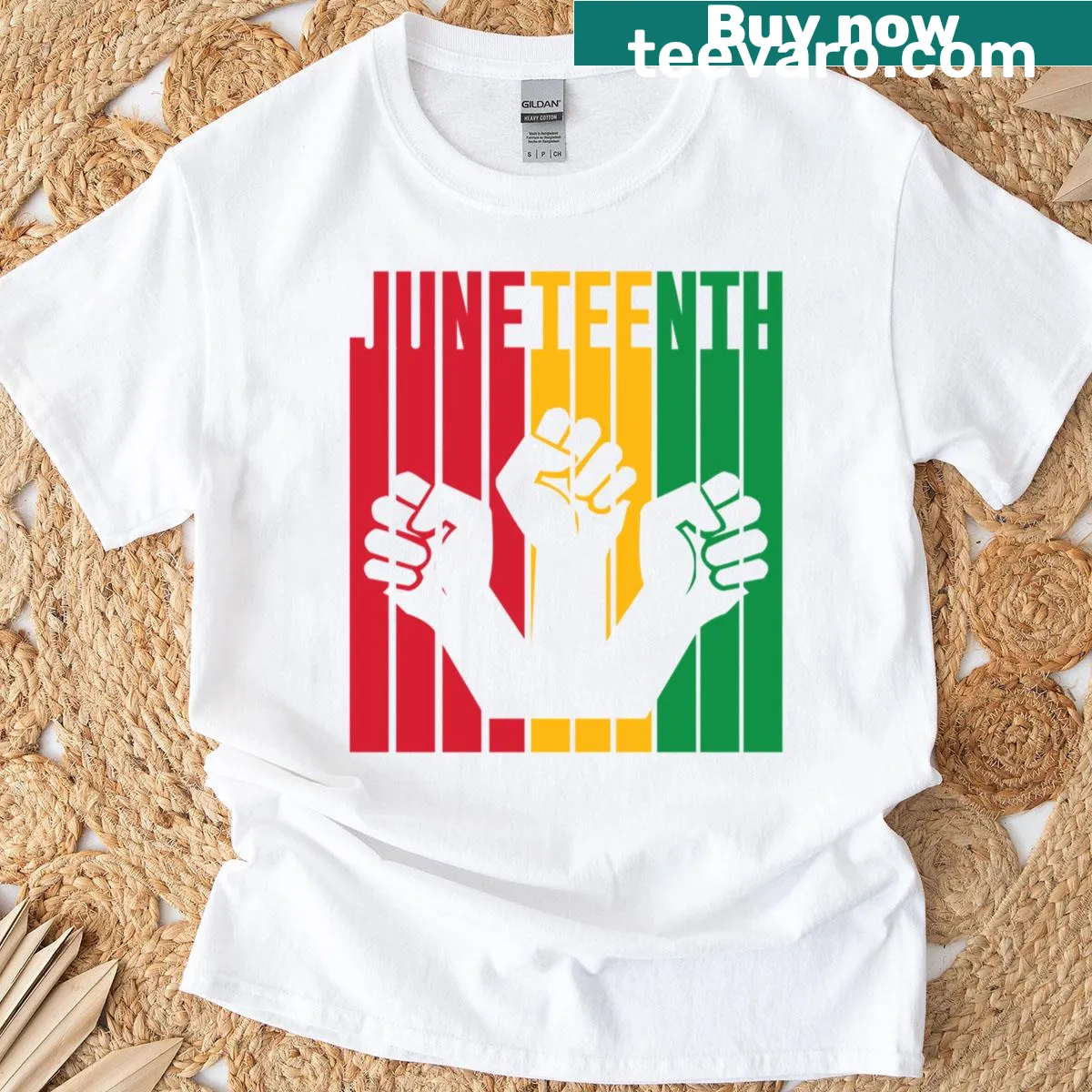 T-shirt featuring raised fists graphic for Juneteenth — on a men's t-shirt