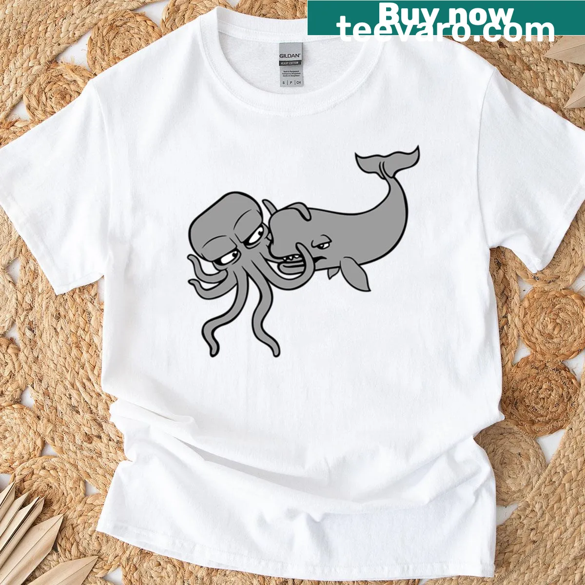 T-shirt depicting an octopus and sperm whale fighting a deep-sea monster — on a men's t-shirt