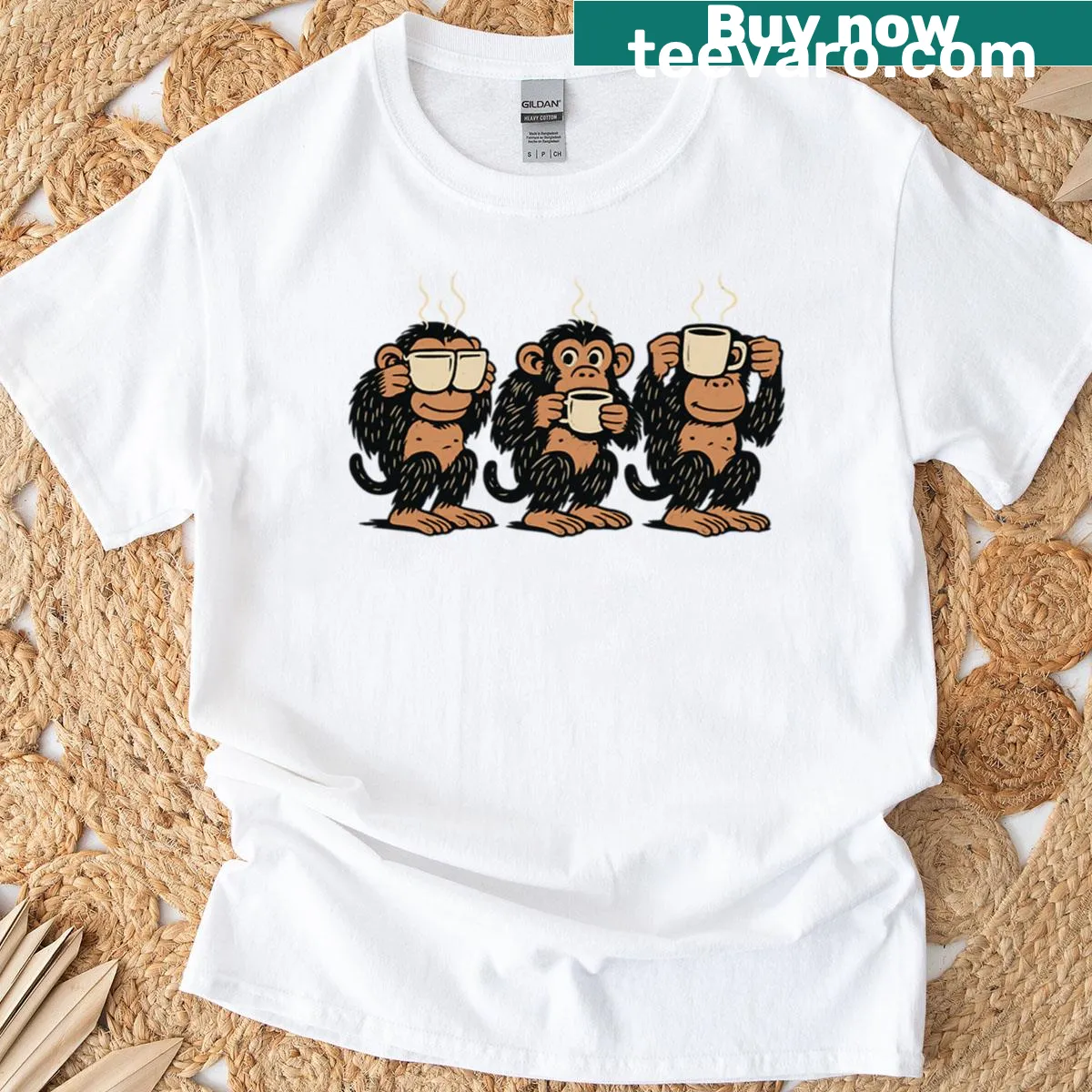 Oversized T-shirt featuring three cartoon monkeys with coffee — on a men's t-shirt