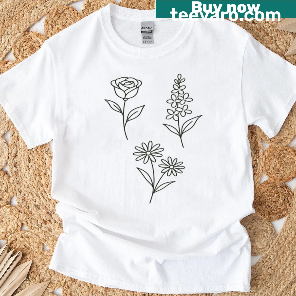 Minimalist line art floral design on a T-shirt. — on a men's t-shirt