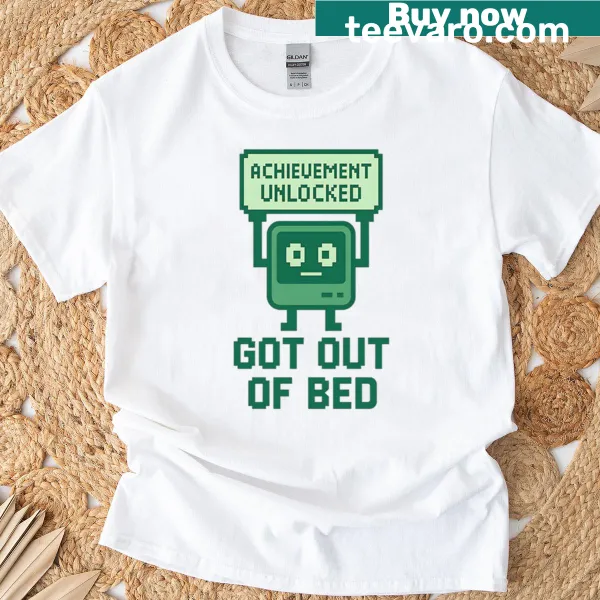 Funny pixel art t-shirt saying 'Achievement Unlocked: Got Out Of Bed'.