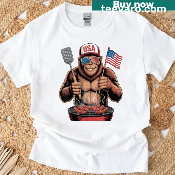 Funny patriotic T-shirt with Bigfoot grilling and USA flag