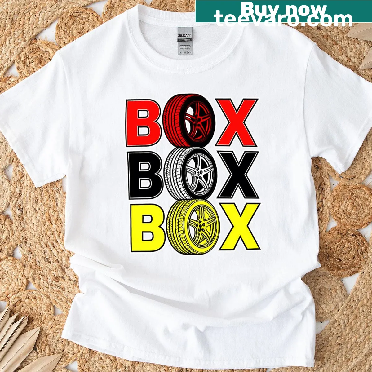 Automotive typography graphic T-shirt featuring box tire logo — on a men's t-shirt