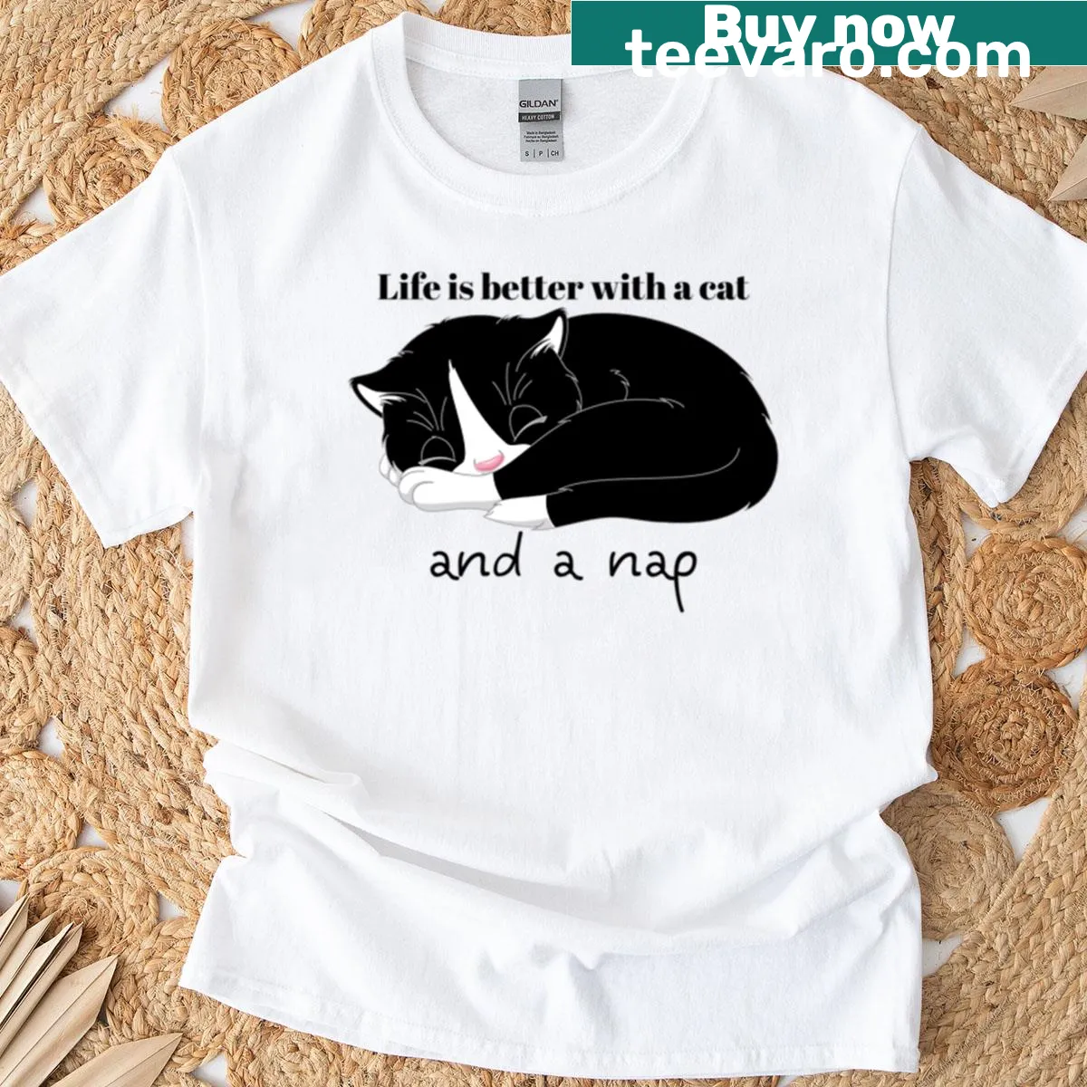 T-shirt featuring cute illustrations of cats napping — on a men's t-shirt