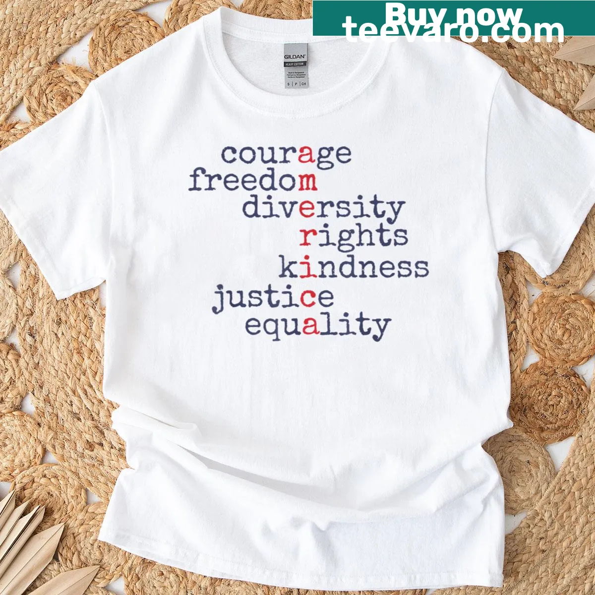 Typography t-shirt featuring words of courage, freedom, and justice in bold letters. — on a men's t-shirt