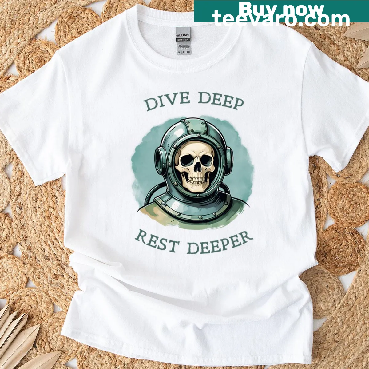 Illustration of a skull with ocean elements and text, Dive Deep Rest Deeper — on a men's t-shirt