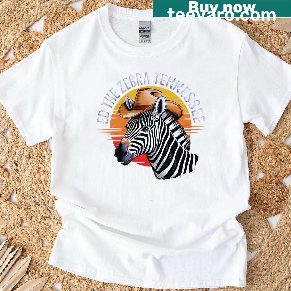 Line-art sketch of Ed the Zebra in cowboy attire against a sunset. — on a men's t-shirt
