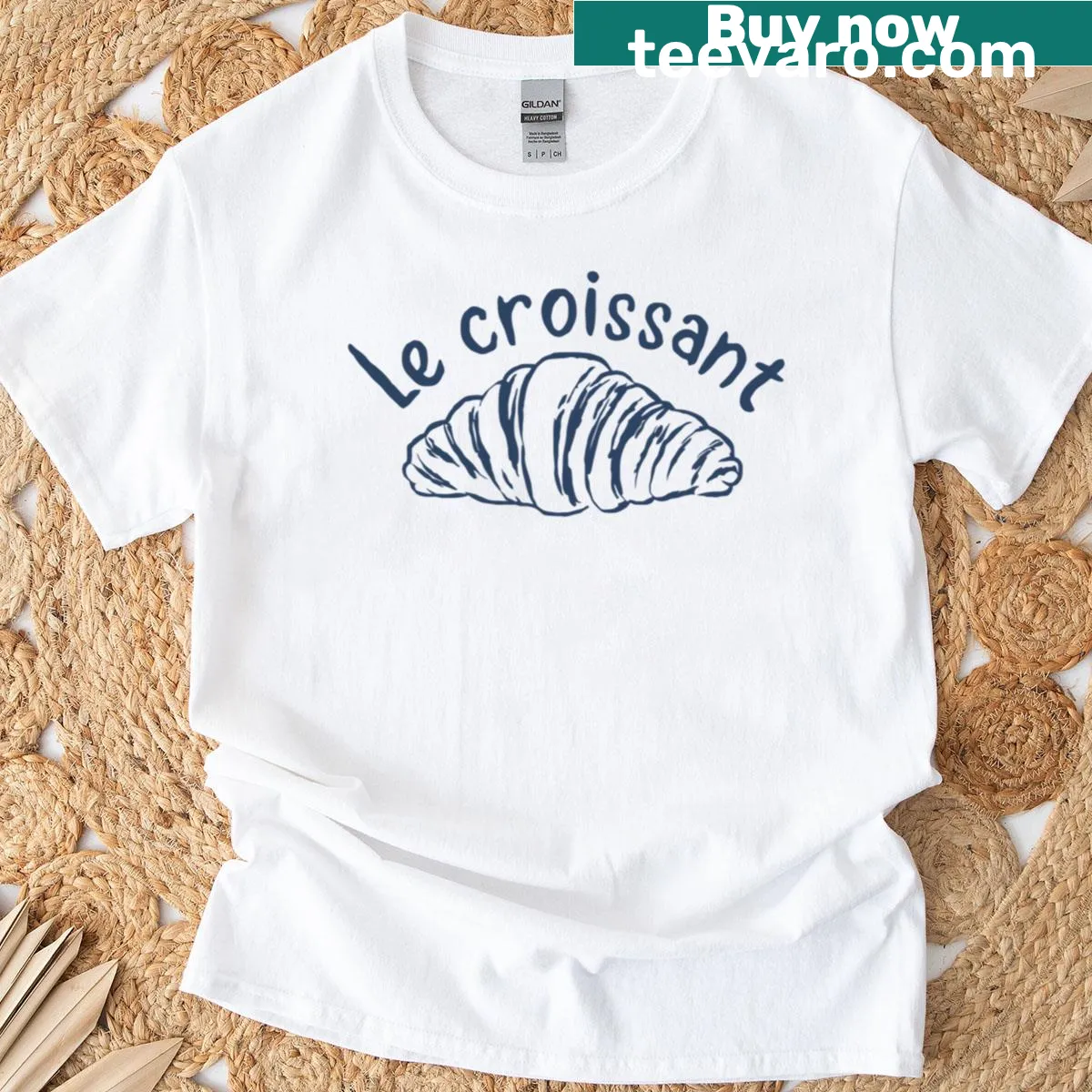 Retro French breakfast T-shirt featuring a croissant illustration. — on a men's t-shirt