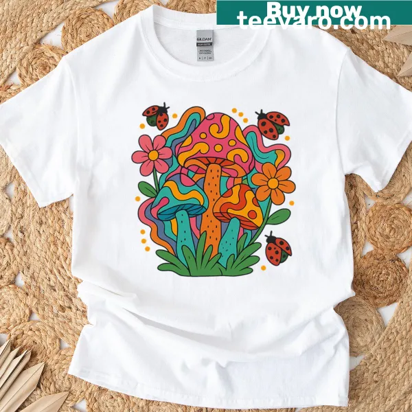 Whimsical garden scene with mushrooms and ladybug on t-shirt