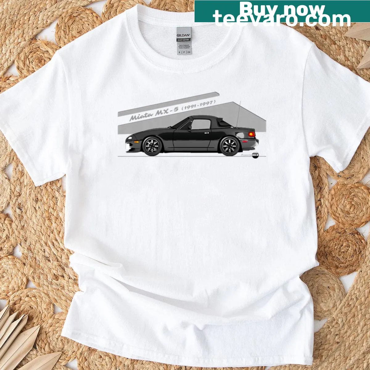 Miata MX-5 NA T-shirt featuring a classic 90s roadster design. — on a men's t-shirt
