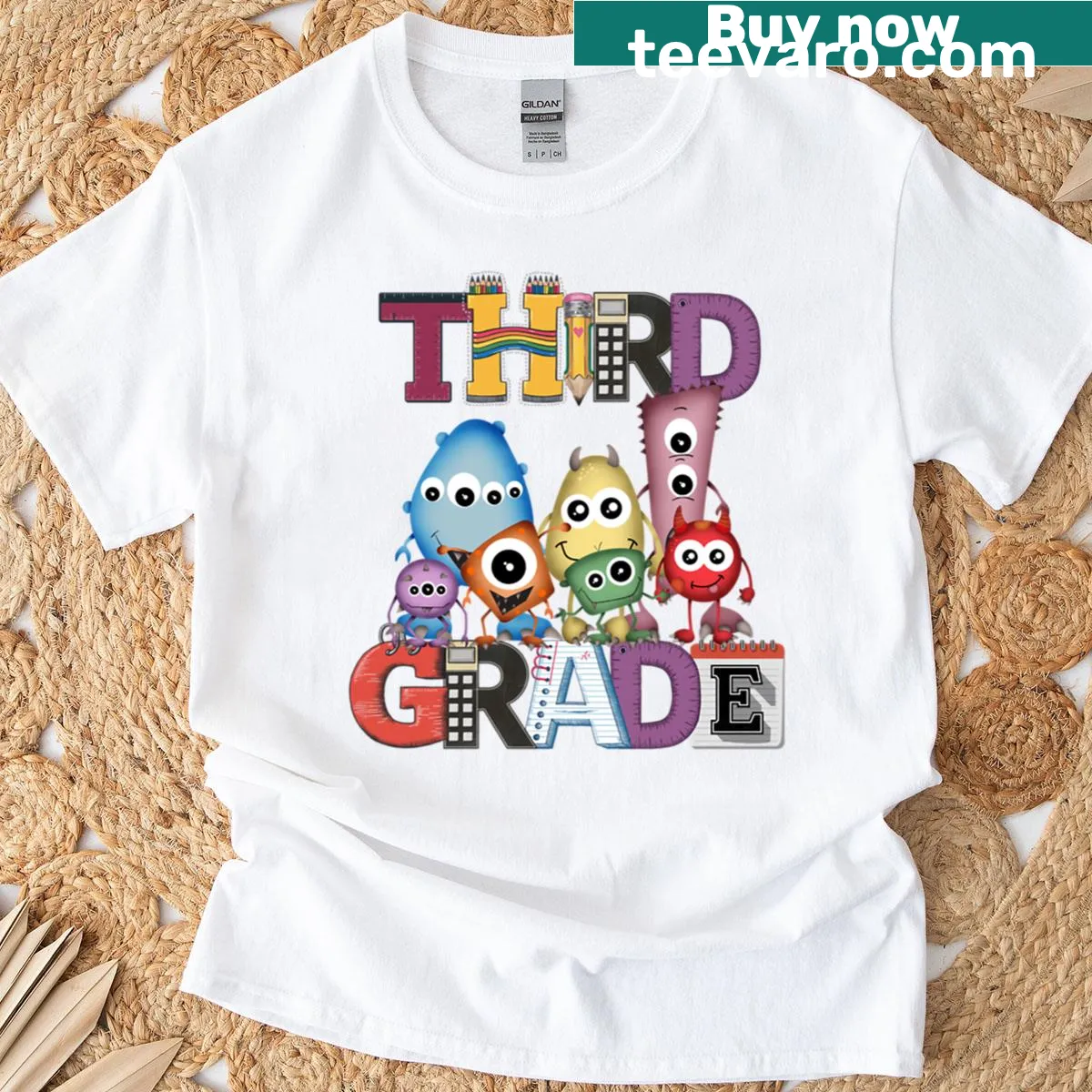 Boxy T-shirt featuring friendly cartoon monsters for kids — on a men's t-shirt