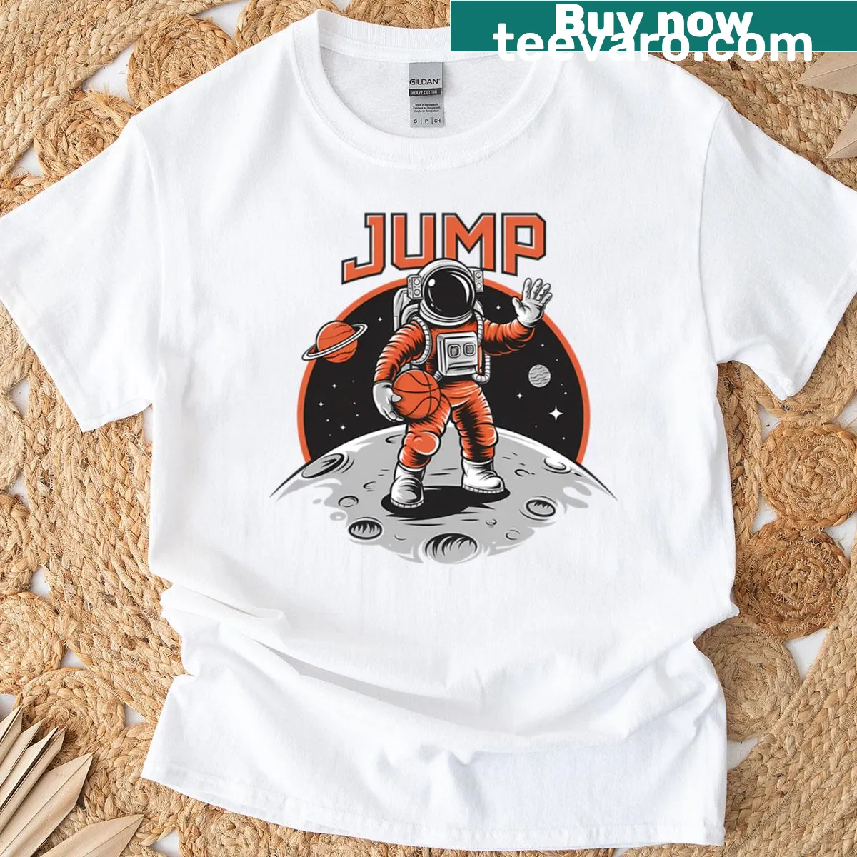 Cartoon astronaut playing basketball on the moon T-shirt — on a men's t-shirt